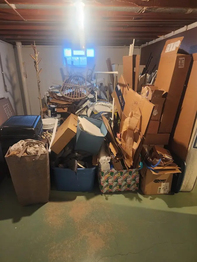 Roll-off dumpster container at job site for Yard Waste Dumpster Rental in Pittsfield